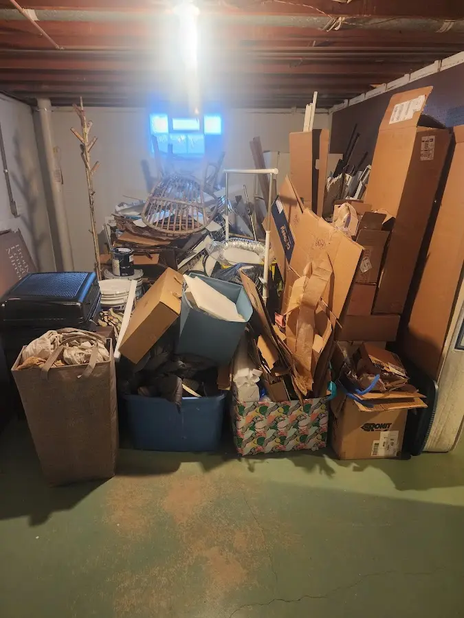 Roll-off dumpster container at job site for 4 Yard Dumpster Rental in Jersey Village